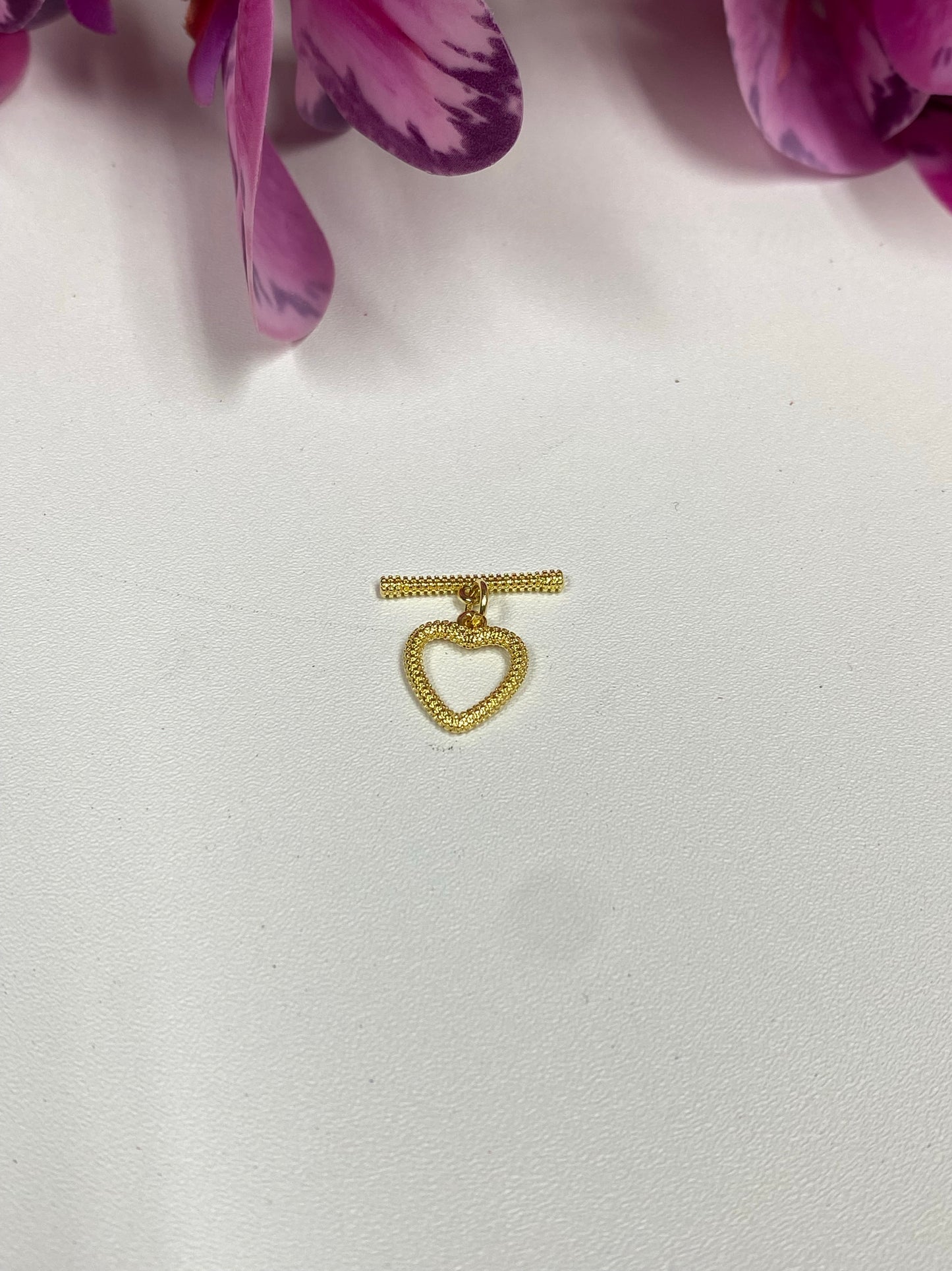 Cierre corazón enchape