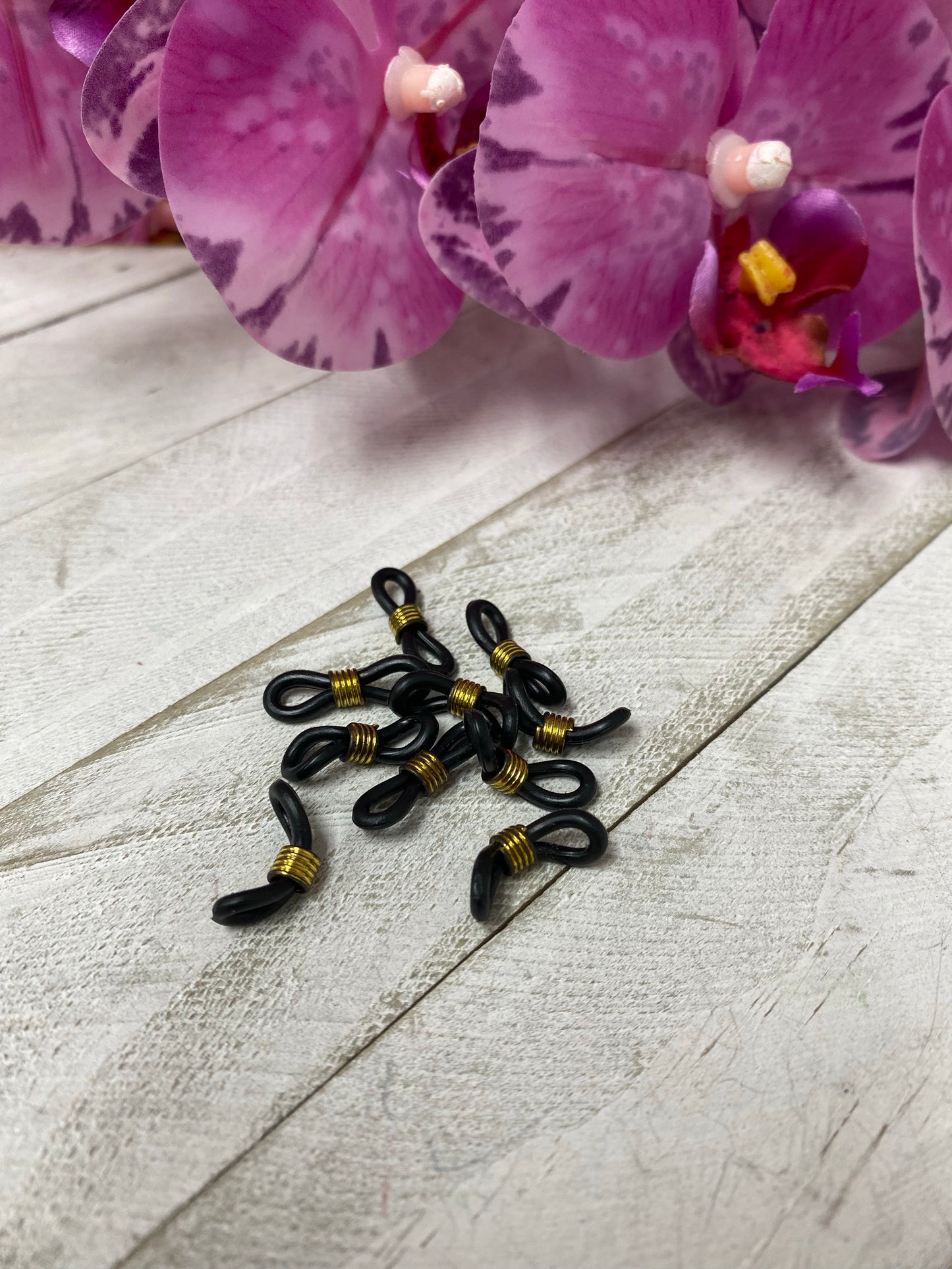 Sujetadores de espejuelos