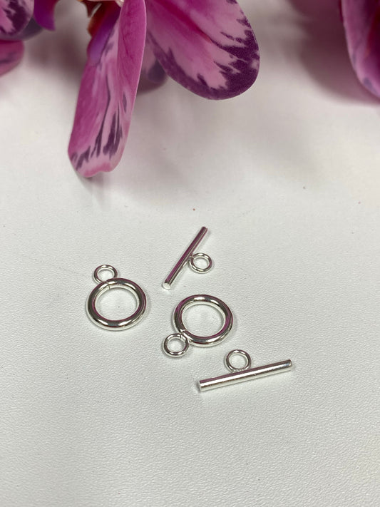 Cierre toggle pequeño plateado